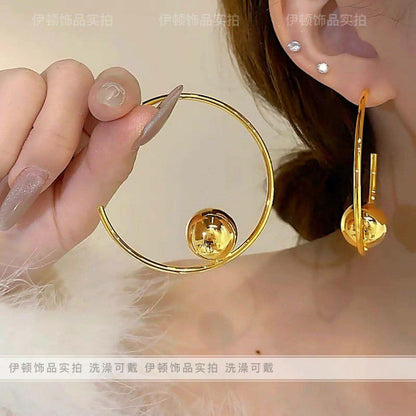 C-shaped earrings